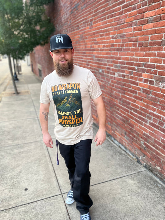 Isaiah 54:17 – No Weapon Shall Prosper Tee
“No weapon formed against you shall prosper.”